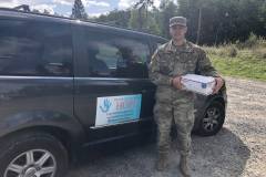 Military photo with care package